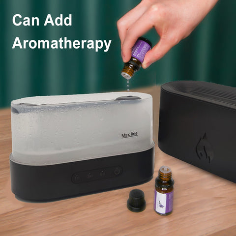 Diffuser with aromatherapy oil compatibility, shown with an oil bottle for easy use.