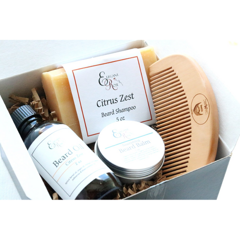 Gift-ready beard care set with shampoo, balm, oil, and comb.