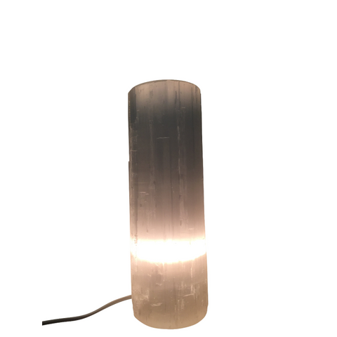 "Selenite crystal flat top lamp with soft glow, showing full lamp shape and structure."