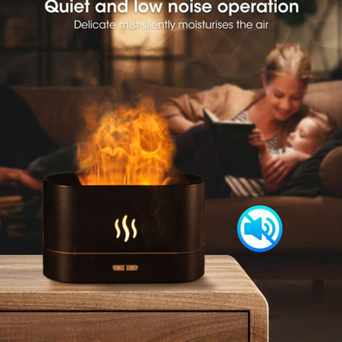 Flame-effect diffuser on a table promoting quiet operation and moisturizing mist.