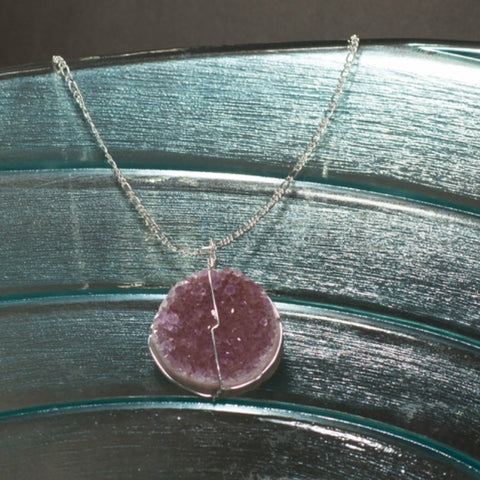 Rose Amethyst Druse Crystal pendant on silver chain.